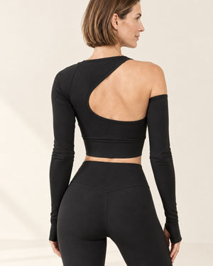 Studio One-Shoulder Cutout Long Sleeve in Black – feature | Velvetella