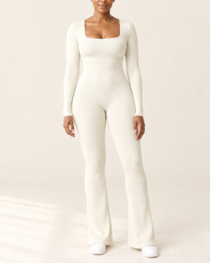 Studio Rib Flare Jumpsuit in Beige – front | Velvetella