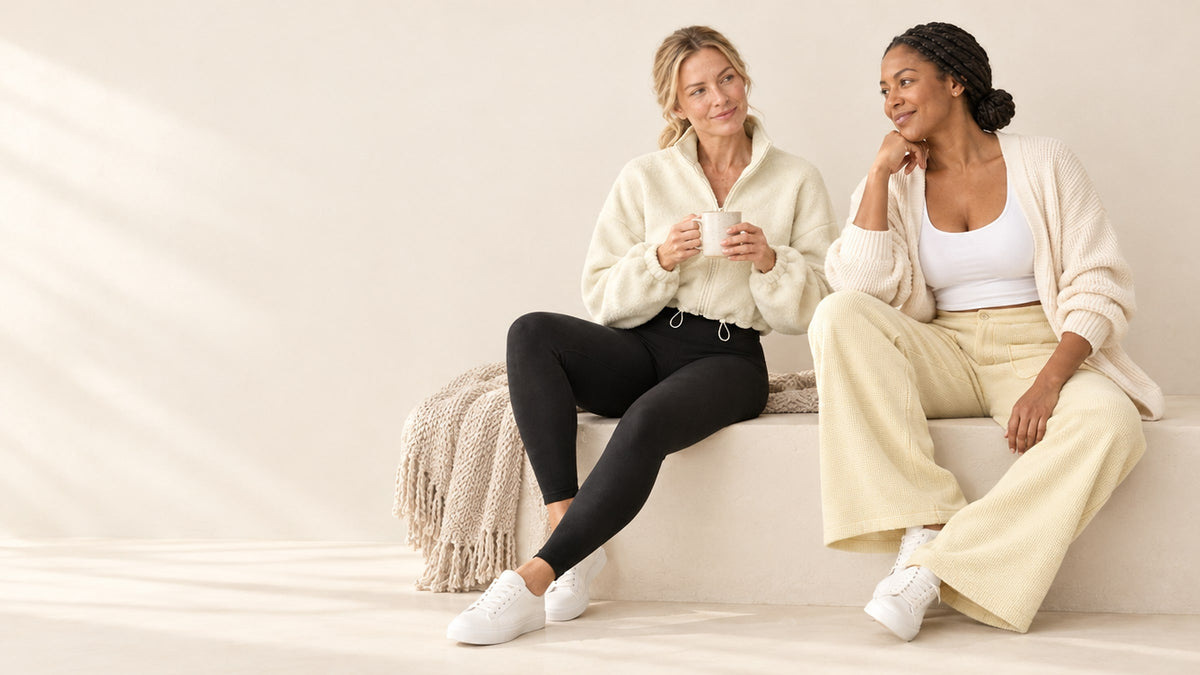 Two women in a cropped polar fleece jacket, fleece-lined leggings and waffle wide-leg pants