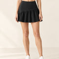 AirMove Pleated Skort in Starry Sky Black – front | Velvetella