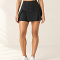 AirMove Pleated Tennis Skirt in Black – front | Velvetella