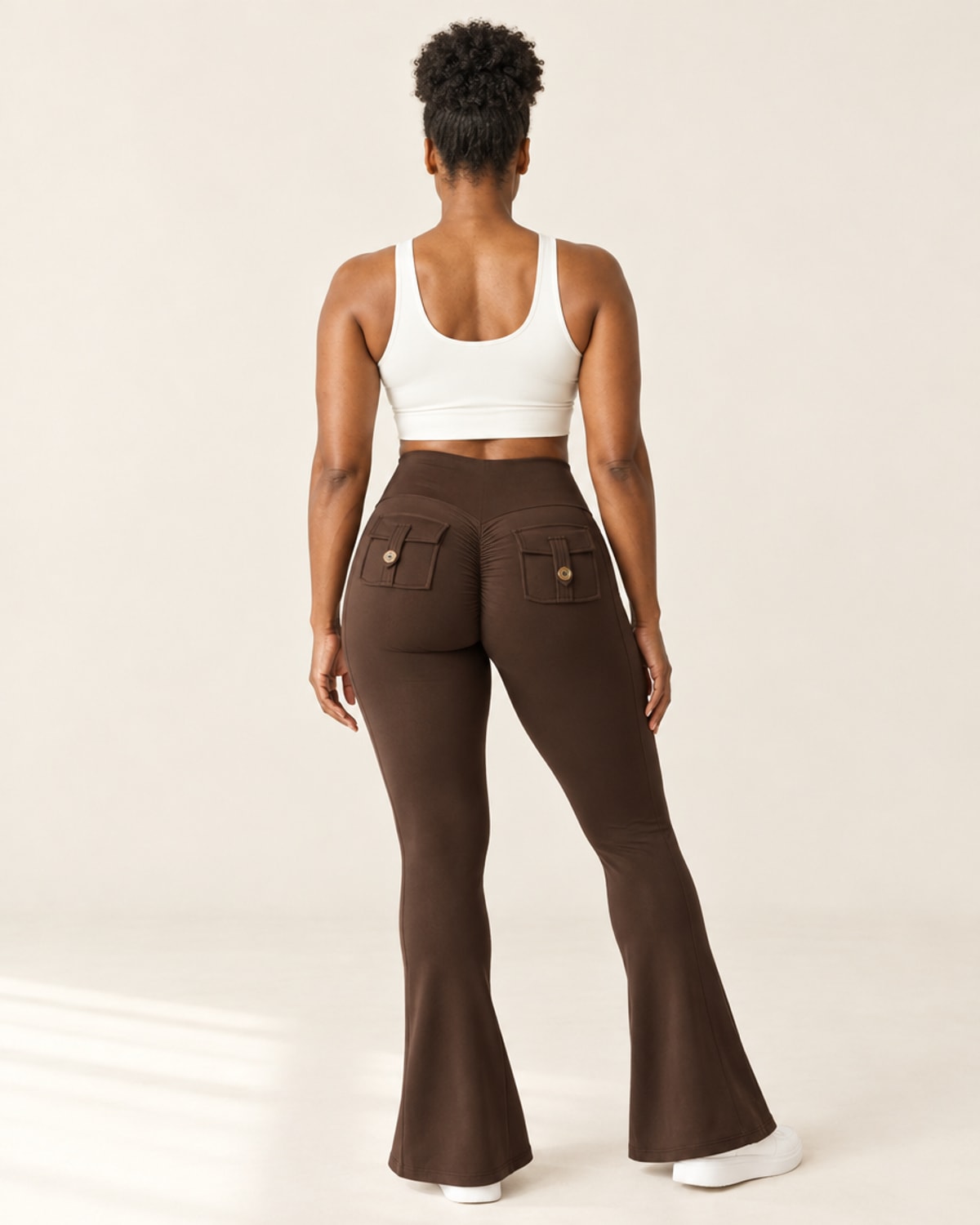 Sculpt Scrunch Flare Pant with Pockets in Brown – back | Velvetella
