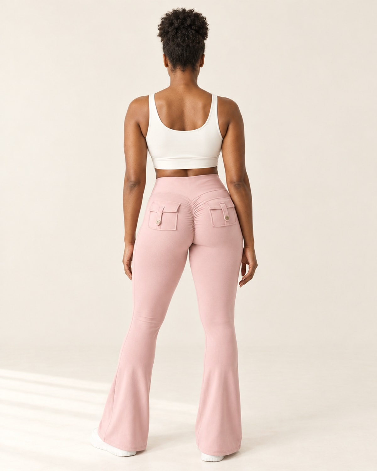 Sculpt Scrunch Flare Pant with Pockets in Pink – back | Velvetella