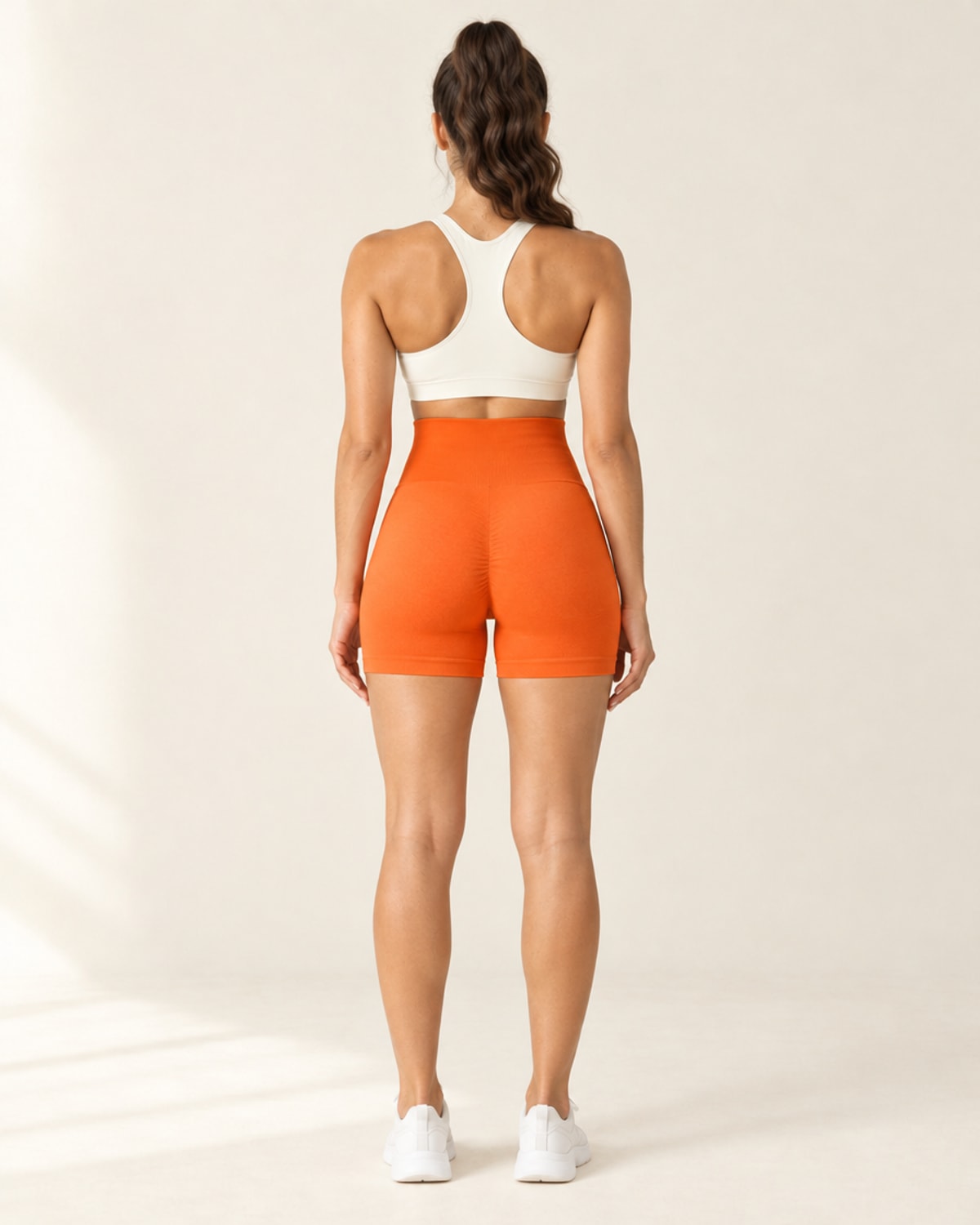Seamless Scrunch Short in Orange – back | Velvetella
