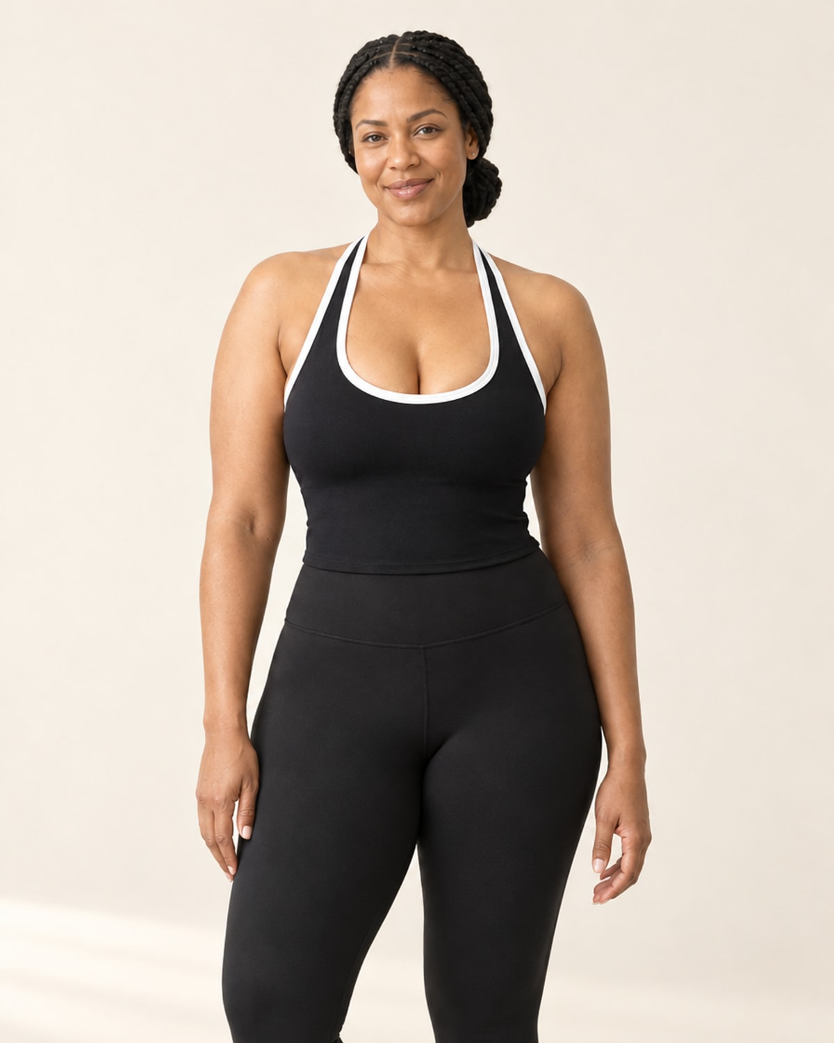 Studio Padded Waist-Length Tank in Black – front | Velvetella