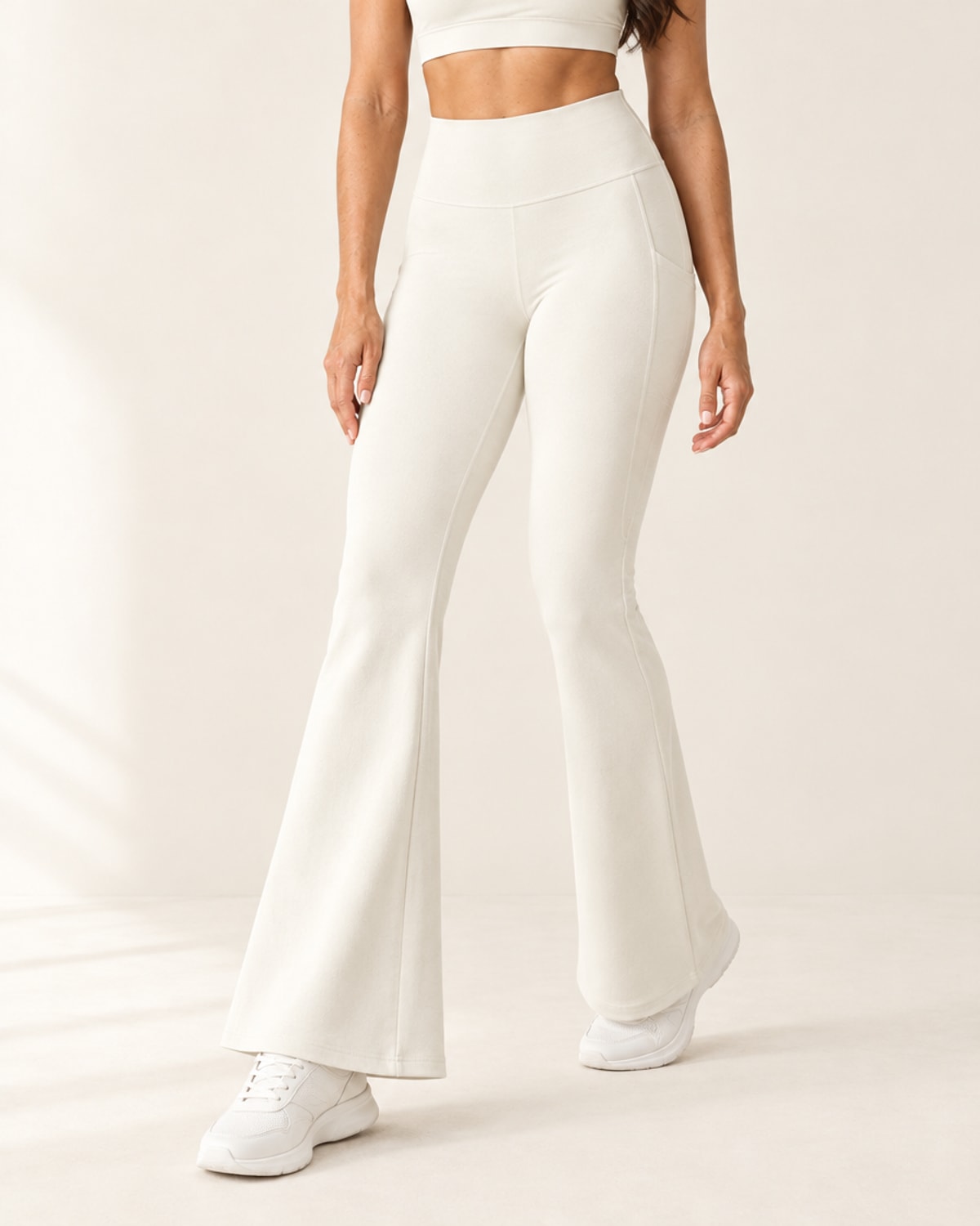 Studio Pocket Bootcut Pant in Coconut Milk White – feature | Velvetella
