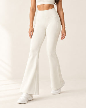 Studio Pocket Bootcut Pant in Coconut Milk White – feature | Velvetella