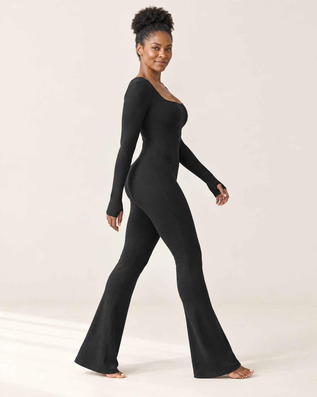 Studio Rib Flare Jumpsuit in Black – feature | Velvetella