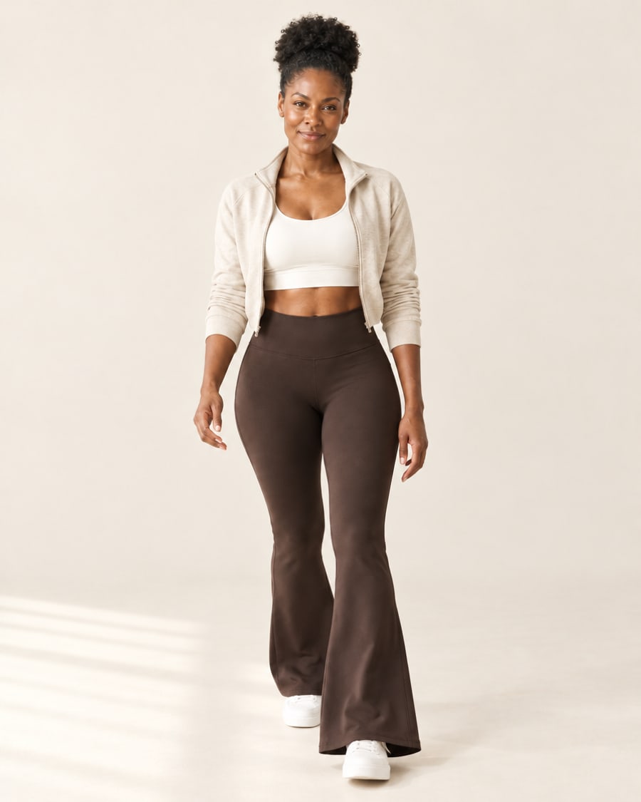 Woman walking in brown high-rise flare leggings